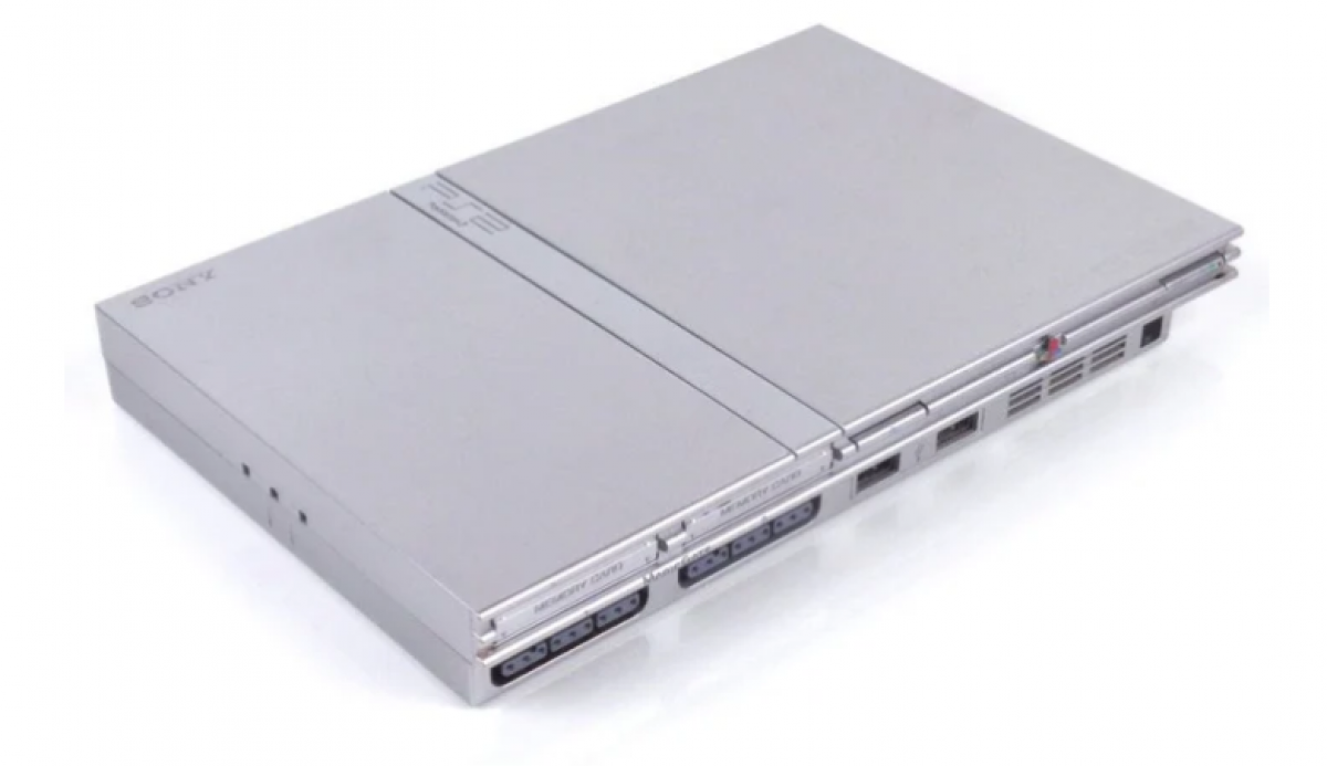 PlayStation 2 Slim PS2 Slim console in Silver Japanese region import includes third-party controller top front