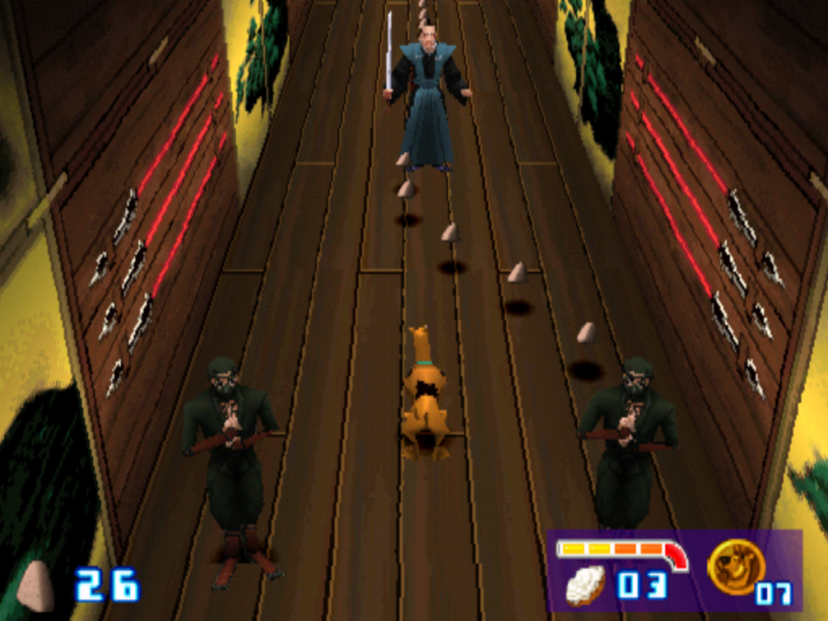 Scooby-Doo and the Cyber Chase Greatest Hits PlayStation 1 action-adventure video game based on the animated film Scooby Shaggy Mystery Inc gang transported into computer world levels based on locations chasing Phantom Virus platforming puzzle solving collectible Scooby snacks THQ Hanna-Barbera license cooperative gameplay screenshot