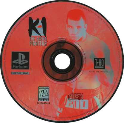 K-1 The Arena Fighters is a 3D kickboxing fighting game for the original PlayStation (PS1), featuring eight real-world K-1 fighters, multiple game modes including One Player, VS, Tournament, and Team Battle, and strategic combat focused on punches, kicks, stamina, power management, and signature moves disc