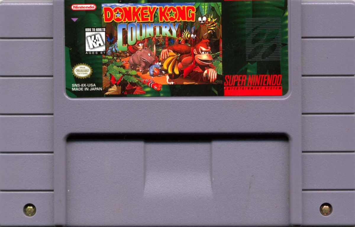 Donkey Kong Country for Super Nintendo Entertainment System (SNES) – original cartridge with classic jungle cover art featuring Donkey Kong and Diddy Kong cartridge