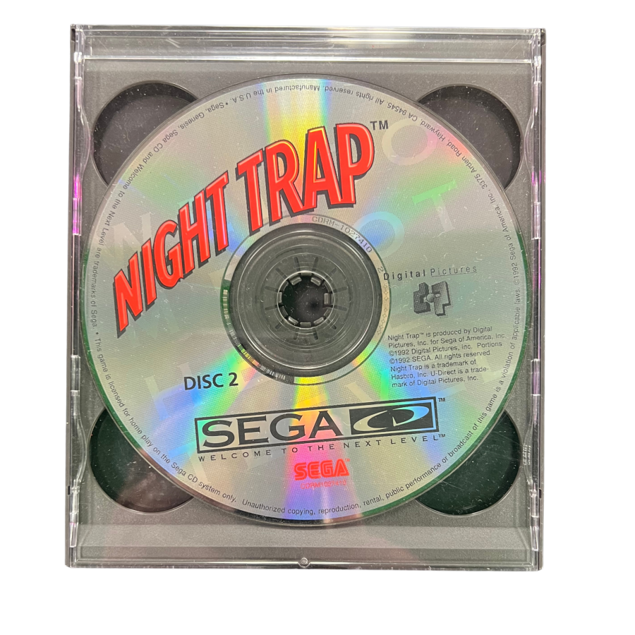 Night Trap Sega CD SCD interactive full motion video adventure game featuring live-action actors suspenseful horror gameplay surveillance cameras trap mechanisms mysterious intruders branching scenes and classic Sega CD gameplay collectible retro gaming appeal disc 2