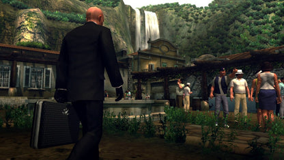 Hitman HD Trilogy Xbox 360 game featuring remastered versions of Hitman 2 Silent Assassin Hitman Contracts and Hitman Blood Money with stealth based gameplay open ended assassination missions upgraded HD visuals and the iconic Agent 47 experience gameplay