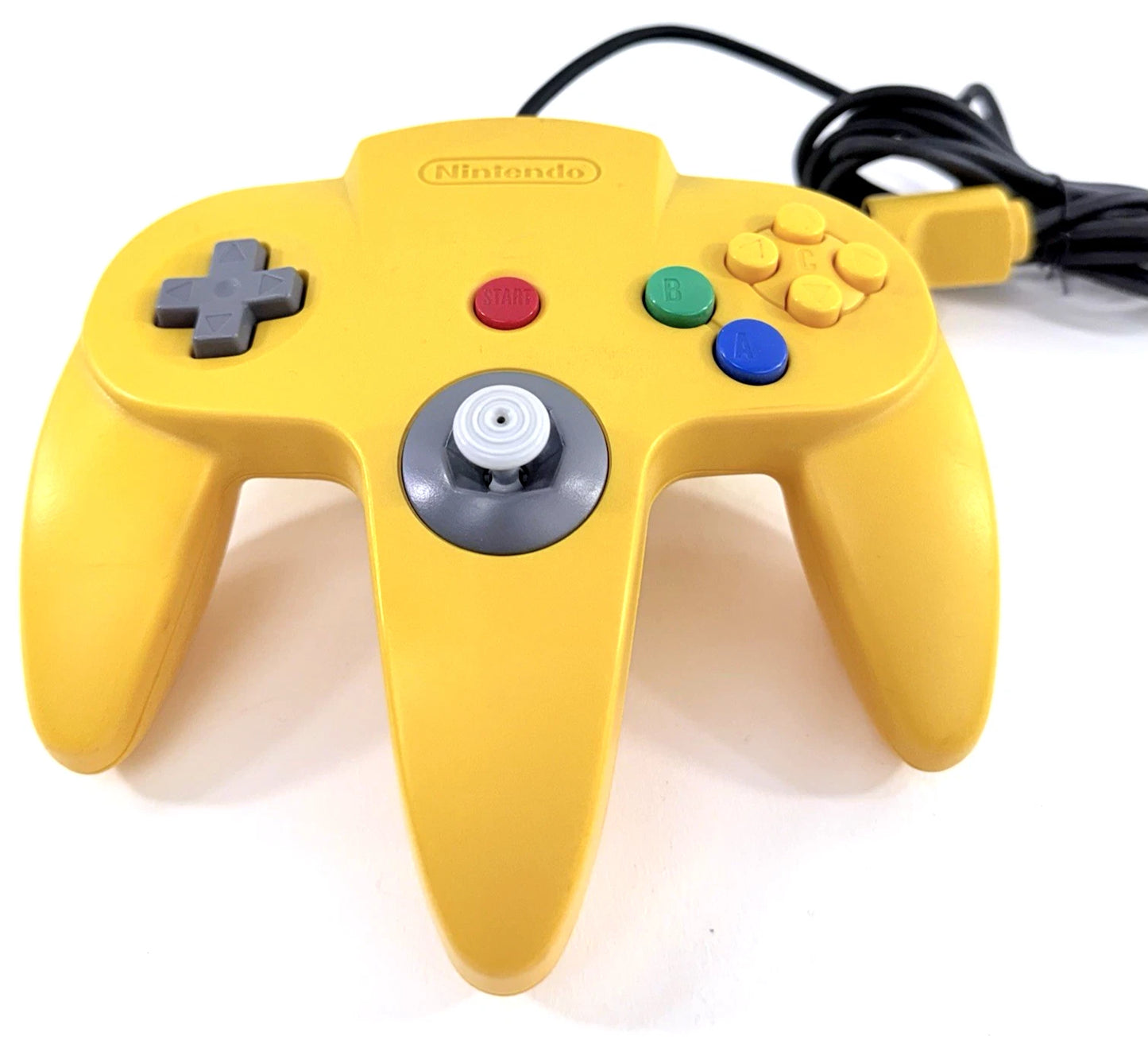 Nintendo 64 Controller Yellow OEM original first party controller for the Nintendo 64 featuring a bright yellow design with analog stick ergonomic three prong grip and responsive buttons for classic multiplayer gaming front