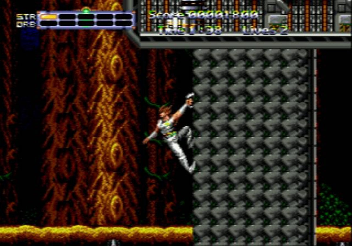Strider Returns Sega Genesis action platformer side scrolling arcade style combat ninja gameplay sword attacks fast paced levels Capcom classic retro gaming Sega Genesis cartridge video game title gameplay