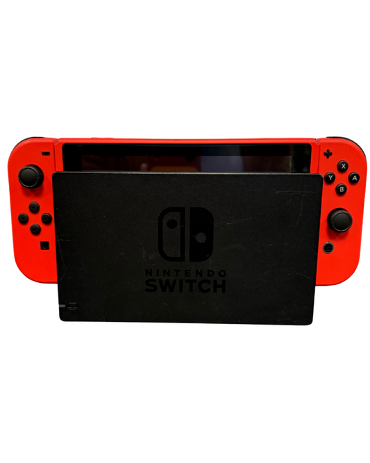 Red Edition Nintendo Switch featuring vibrant red Joy-Con controllers and portable hybrid gaming design with black dock