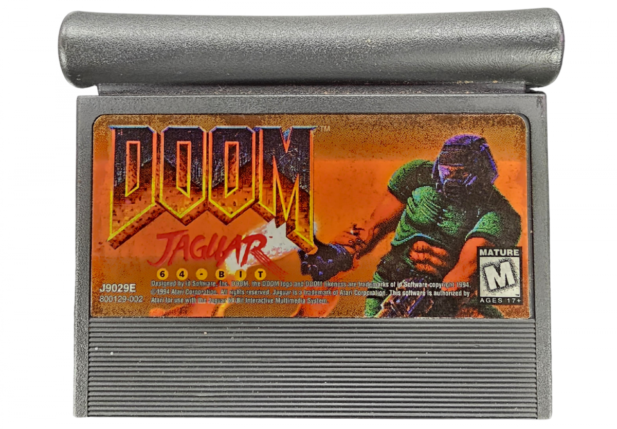 DOOM Atari Jaguar JAG for first person shooter video game fans featuring demon battles dark corridors space marine combat powerful weapons shotgun plasma gun rocket launcher enemy monsters secret areas challenging levels and classic Atari Jaguar gameplay collectible retro gaming appeal front