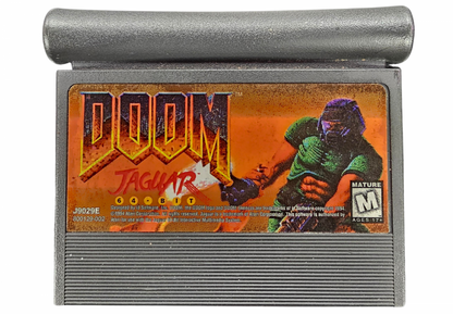 DOOM Atari Jaguar JAG for first person shooter video game fans featuring demon battles dark corridors space marine combat powerful weapons shotgun plasma gun rocket launcher enemy monsters secret areas challenging levels and classic Atari Jaguar gameplay collectible retro gaming appeal front