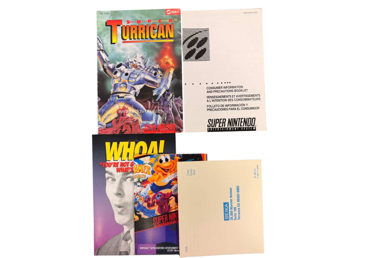 Super Turrican Super Nintendo Entertainment System SNES retro video game action platformer featuring futuristic combat powerful weapons alien enemies challenging levels explosive action classic 16 bit graphics Super Nintendo gaming experience retro game collection appeal front of manuals