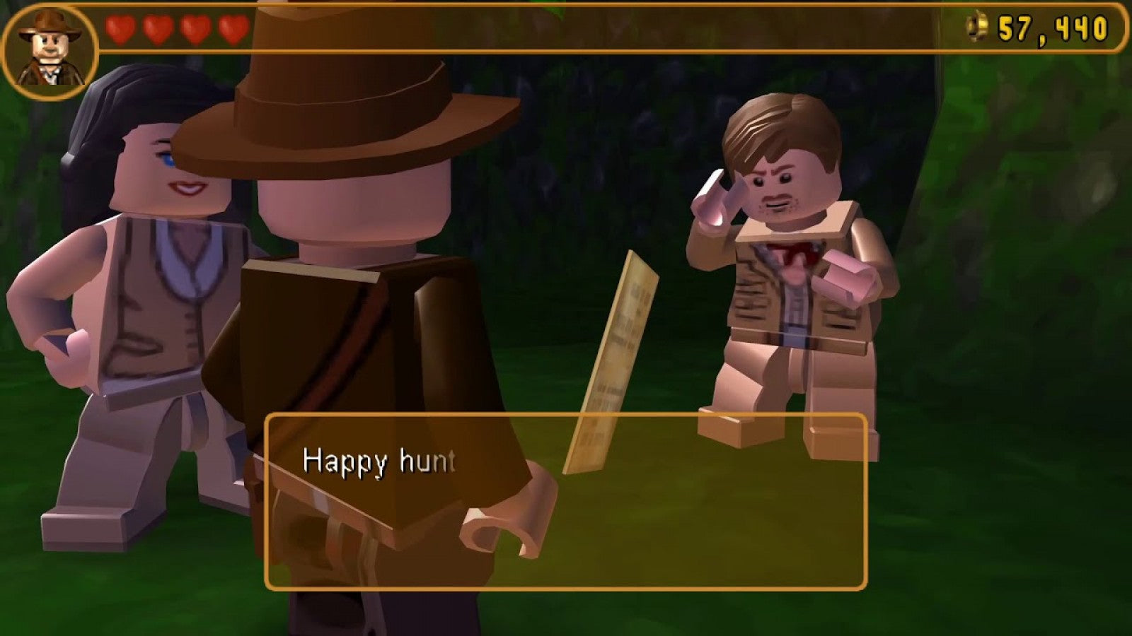 LEGO Indiana Jones The Original Adventures PlayStation Portable box art displaying the adventurous Lego minifigure and action scenes gameplay screenshot