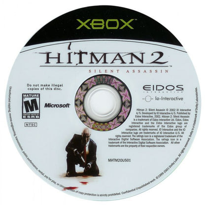Hitman 2 Silent Assassin stealth action video game featuring Agent 47 tactical assassination missions disguises open ended level design and classic IO Interactive hitman franchise gameplay experience disc
