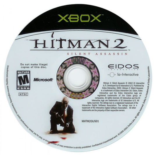 Hitman 2 Silent Assassin stealth action video game featuring Agent 47 tactical assassination missions disguises open ended level design and classic IO Interactive hitman franchise gameplay experience disc