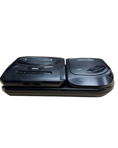 Front view of the Model 2 Sega Genesis console connected to the Model 2 Sega CD with cartridge slot and disc tray visible