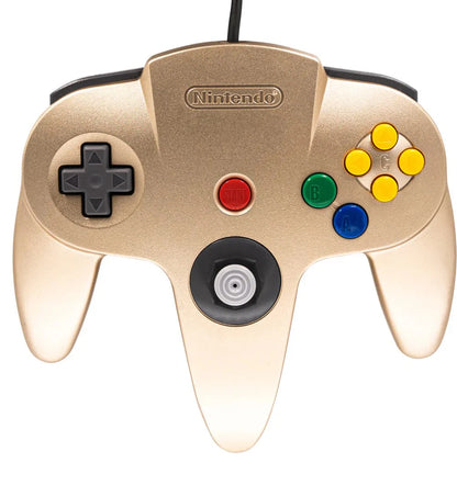 Front view of the gold Nintendo 64 controller, showing joystick, D-pad, action buttons, and ergonomic design for comfortable gameplay