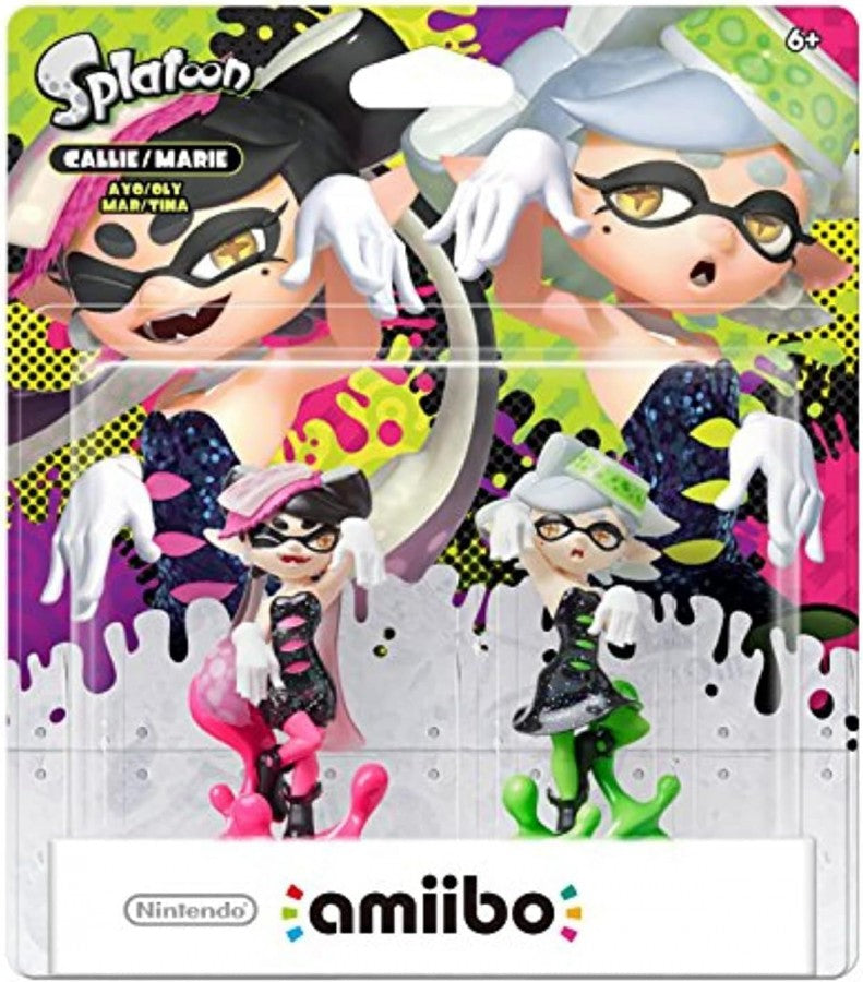 Callie & Marie Amiibo (2‑Pack, Sealed) — featuring the Squid Sisters from Splatoon. Callie appears in her black-and-pink idol outfit with a cheerful pose, while Marie stands in her black-and-green attire with her signature calm expression. Both figures unlock exclusive in‑game content in Splatoon titles.
