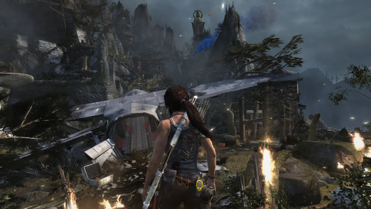 Ultimate Action Triple Pack PlayStation 3 compilation bundle containing Tomb Raider Lara Croft action adventure platforming puzzle solving Sleeping Dogs open world martial arts Hong Kong undercover cop crime drama Just Cause 2 Rico Rodriguez grappling hook parachute explosive open world chaos Square Enix third person collection Tomb Raider gameplay screenshot