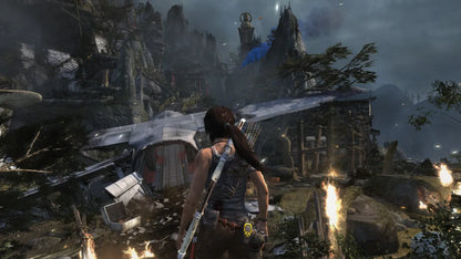 Ultimate Action Triple Pack PlayStation 3 compilation bundle containing Tomb Raider Lara Croft action adventure platforming puzzle solving Sleeping Dogs open world martial arts Hong Kong undercover cop crime drama Just Cause 2 Rico Rodriguez grappling hook parachute explosive open world chaos Square Enix third person collection Tomb Raider gameplay screenshot