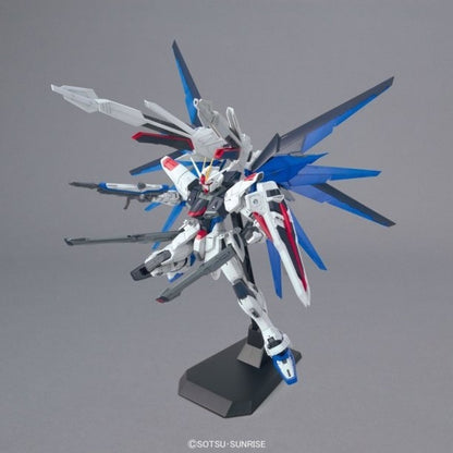 ZGMF-X10A Freedom Gundam Ver 2.0 Bandai MG model kit, Master Grade Gunpla, Gundam SEED mobile suit, detailed buildable mecha collectible top down on stand