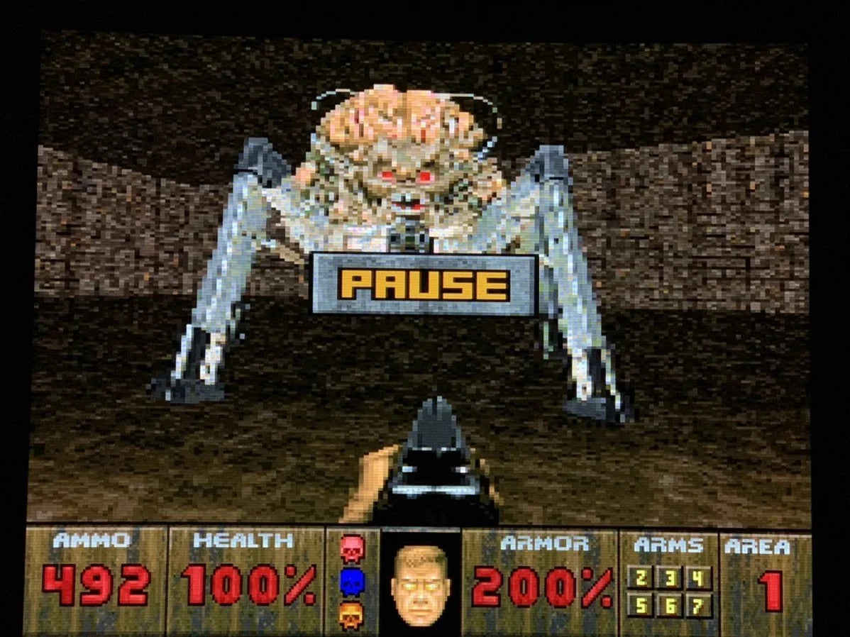 DOOM Atari Jaguar JAG for first person shooter video game fans featuring demon battles dark corridors space marine combat powerful weapons shotgun plasma gun rocket launcher enemy monsters secret areas challenging levels and classic Atari Jaguar gameplay collectible retro gaming appeal gameplay