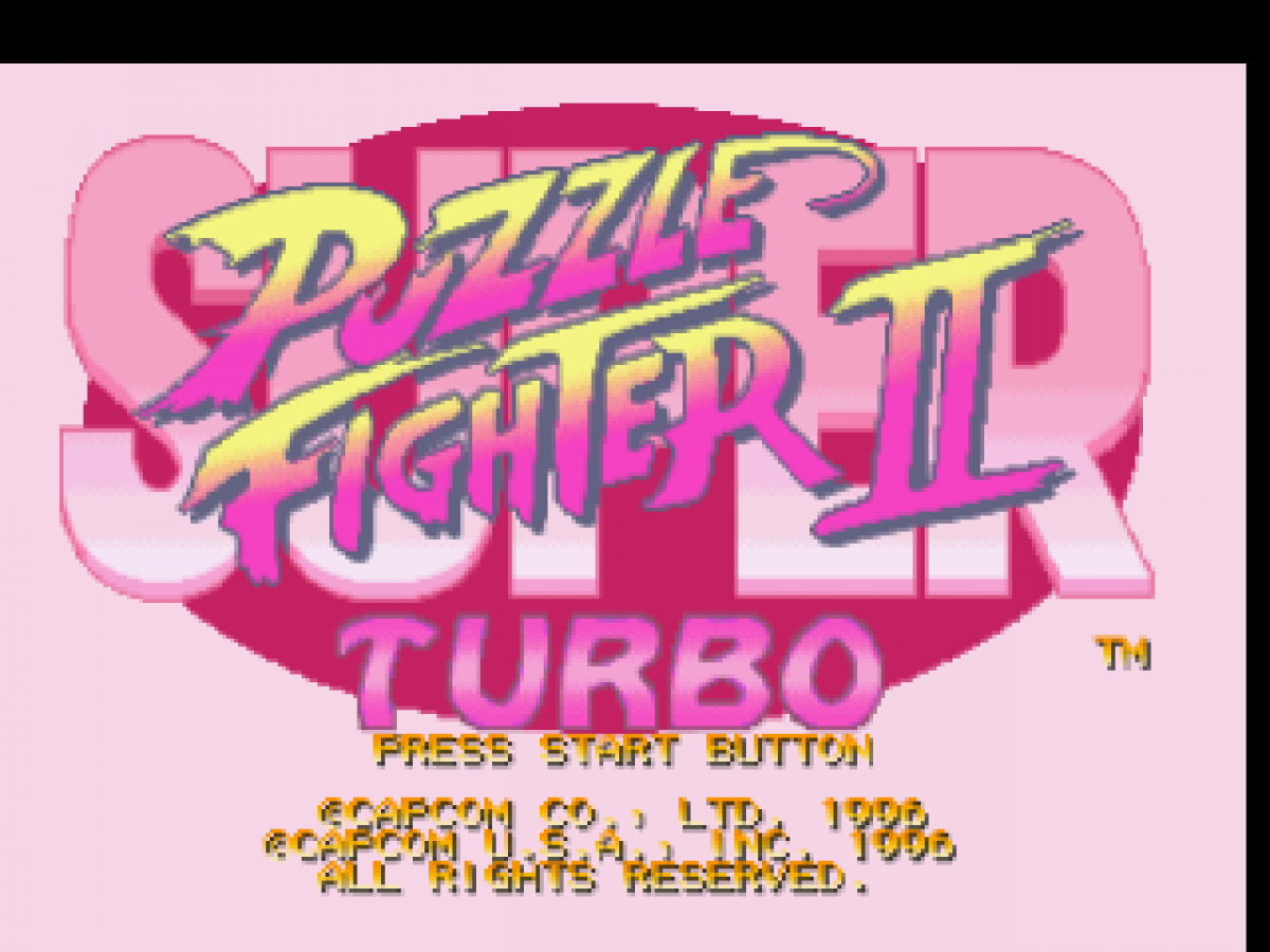 Title screen for Super Puzzle Fighter II Turbo PlayStation 1 game featuring competitive gem-matching puzzle gameplay with Capcom characterse