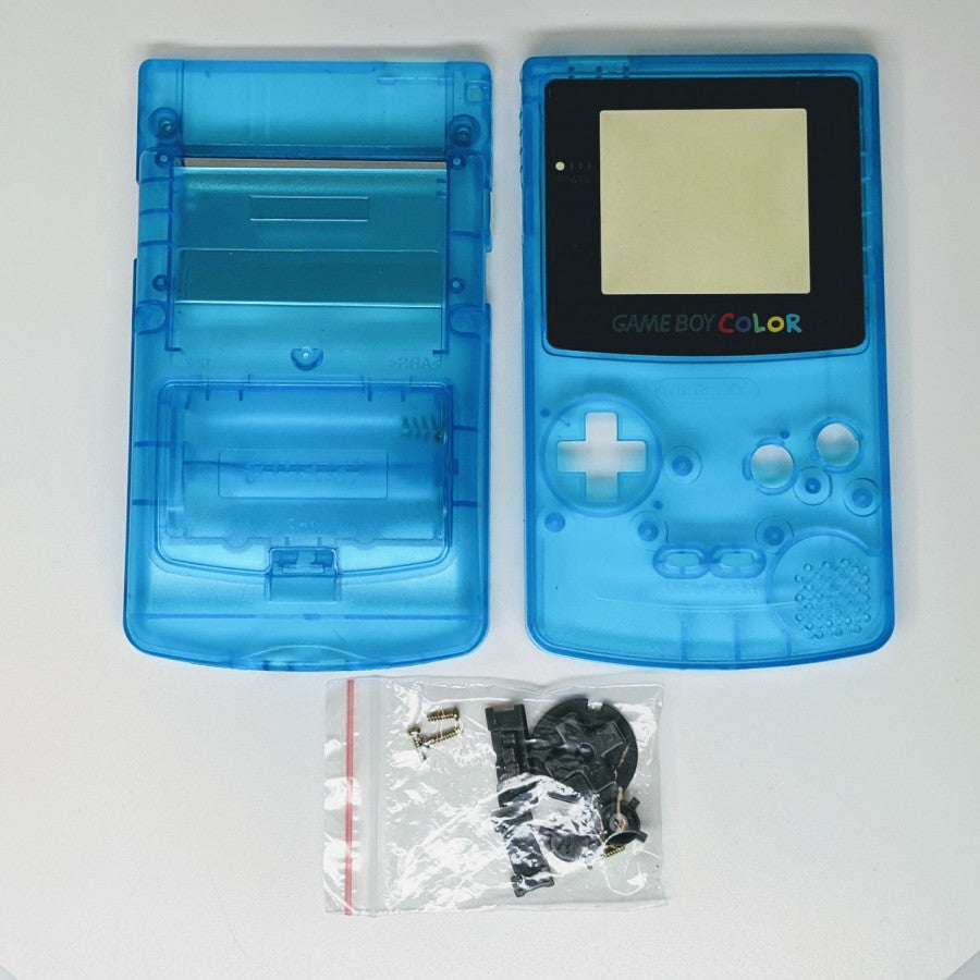 Game Boy Color GBC handheld console, custom blue clear shell, portable Nintendo system, retro gaming, scratch and scuff cosmetic condition deconstructed shell contents