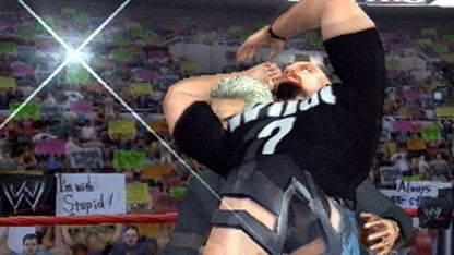 Retro WWE SmackDown Shut Your Mouth Greatest Hits PS2 inspired design featuring classic wrestling entertainment aesthetic vintage PlayStation 2 arena combat superstar roster grappling strikes entrances storyline mode sports entertainment chaos nostalgic WWE wrestling game presentation - gameplay