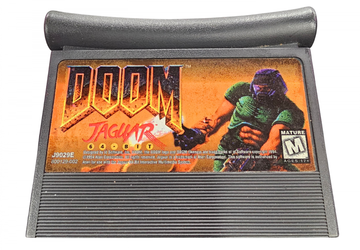 DOOM Atari Jaguar JAG for first person shooter video game fans featuring demon battles dark corridors space marine combat powerful weapons shotgun plasma gun rocket launcher enemy monsters secret areas challenging levels and classic Atari Jaguar gameplay collectible retro gaming appeal detail angle
