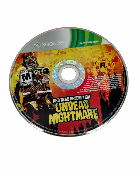 Red Dead Redemption: Undead Nightmare [Platinum Hits] for Xbox 360 (X360) at Gamers INC, featuring the critically acclaimed supernatural expansion that transforms the American frontier into a zombie-infested wasteland, where John Marston must find a cure for the plague through a new single-player campaign, mythic creature hunts, and intense "Undead Overrun" multiplayer modes in a definitive Platinum Hits release disc 