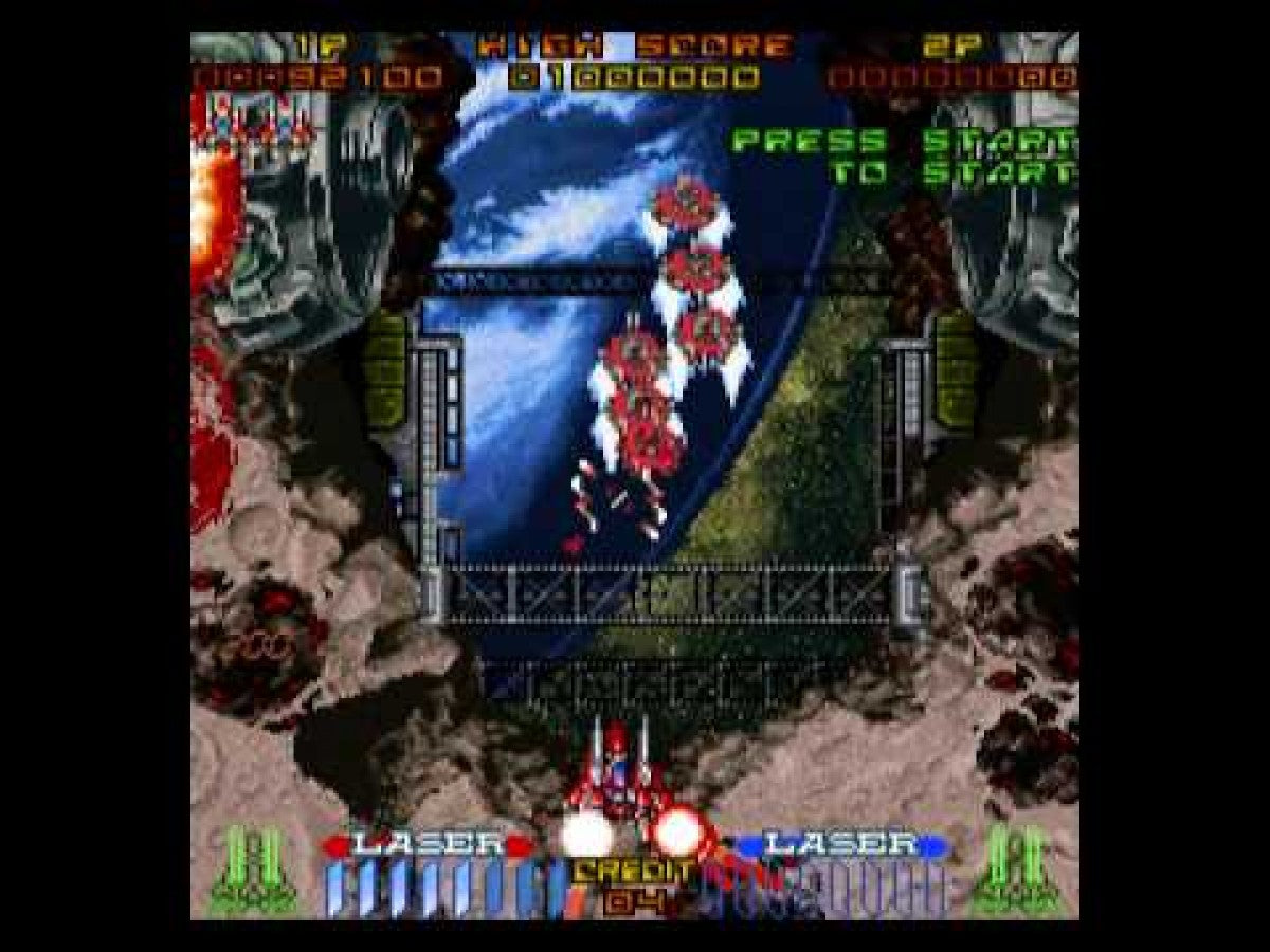 Galactic Attack Sega Saturn vertical scrolling shoot em up shmup arcade space shooter layered sprite graphics fast paced enemy waves power ups sci fi spaceship combat Taito arcade classic retro gaming Sega Saturn software video game title gameplay