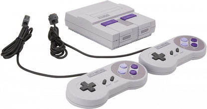 Front view of the Super Nintendo Entertainment System (SNES) Mini console with compact gray design, purple power and reset buttons, and two controller ports.