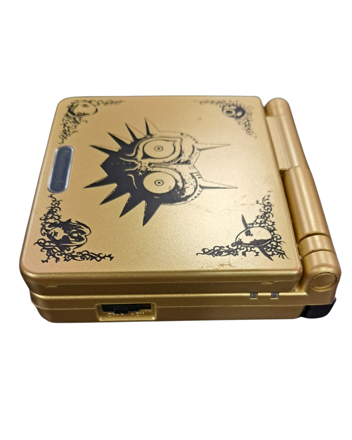 Game Boy Advance SP AGS-101 Custom Majora's Mask Shell Nintendo Game Boy Advance SP handheld console AGS-101 model with backlit screen custom Majora's Mask themed shell clamshell design rechargeable battery portable retro gaming system closed side
