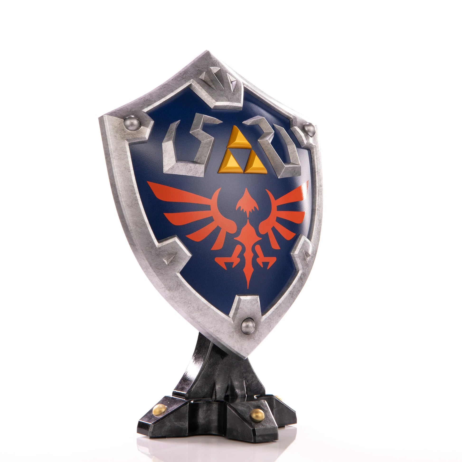 Hylian Shield 12 inch statue by First 4 Figures detailed Legend of Zelda collectible featuring iconic Hylian crest battle ready shield design and premium high quality display piece for fans of Nintendo fantasy adventure franchise front of shield