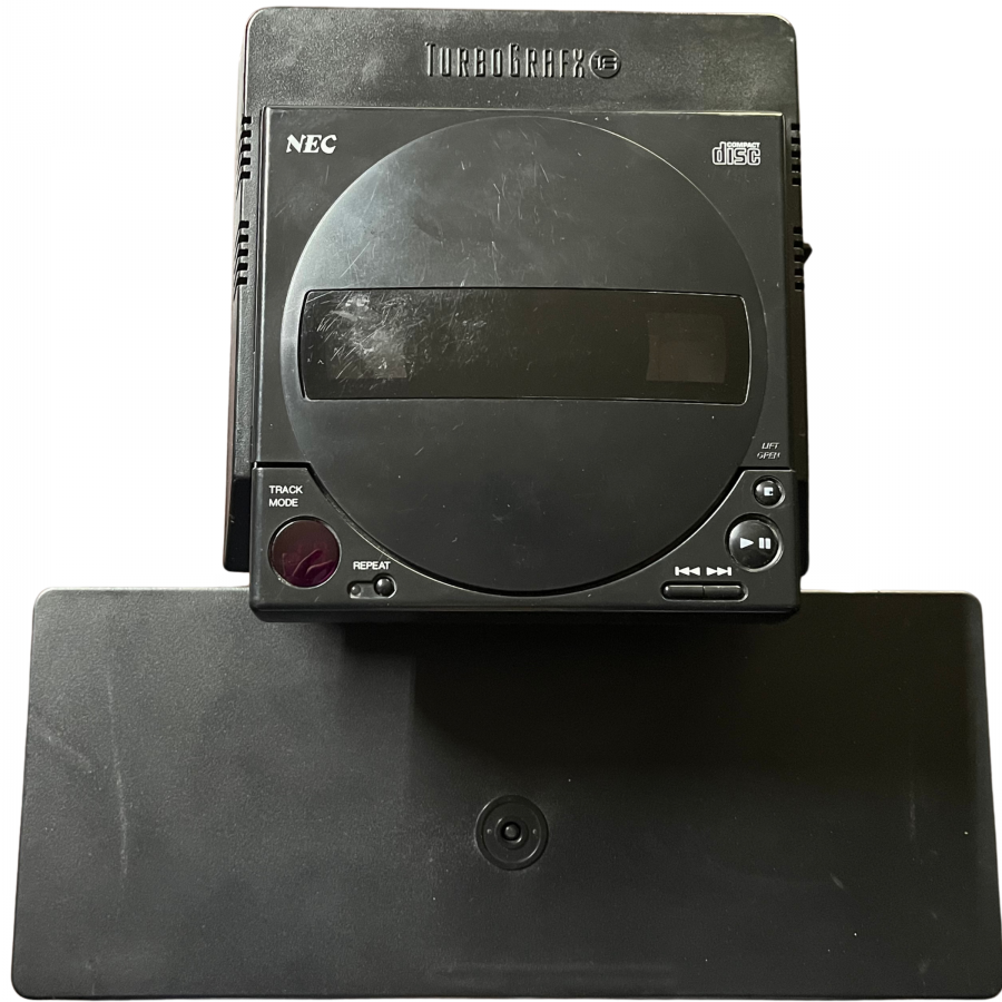 TurboGrafx CD System for retro video game enthusiasts featuring classic CD based gaming hardware expanded game library support enhanced audio and cinematic presentation compatibility with TurboGrafx titles vintage console technology collector focused entertainment and collectible gaming appeal unit top