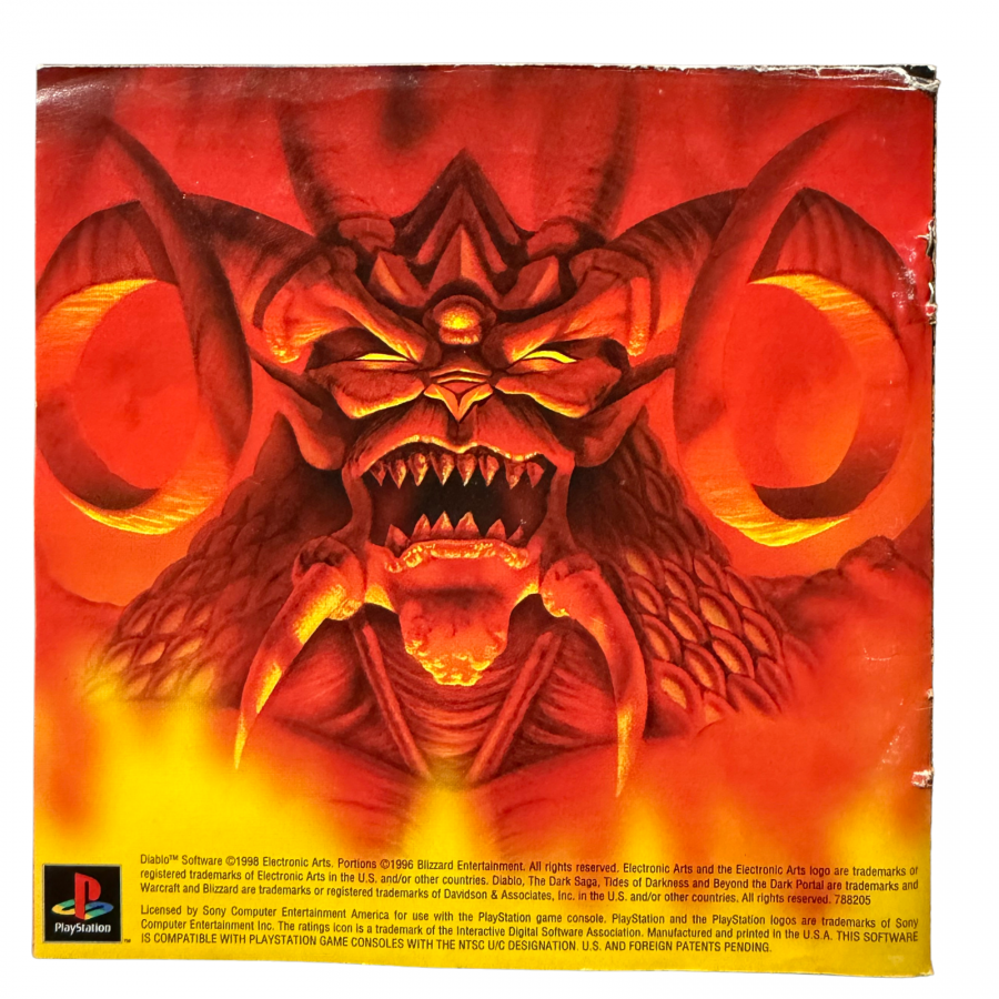 Diablo PlayStation PS1 for action role playing video game fans featuring dark fantasy dungeon exploration real time combat demon battles powerful weapons character progression loot collection spell casting challenging enemies and atmospheric gothic adventure collectible retro PlayStation gaming appeal back of manual