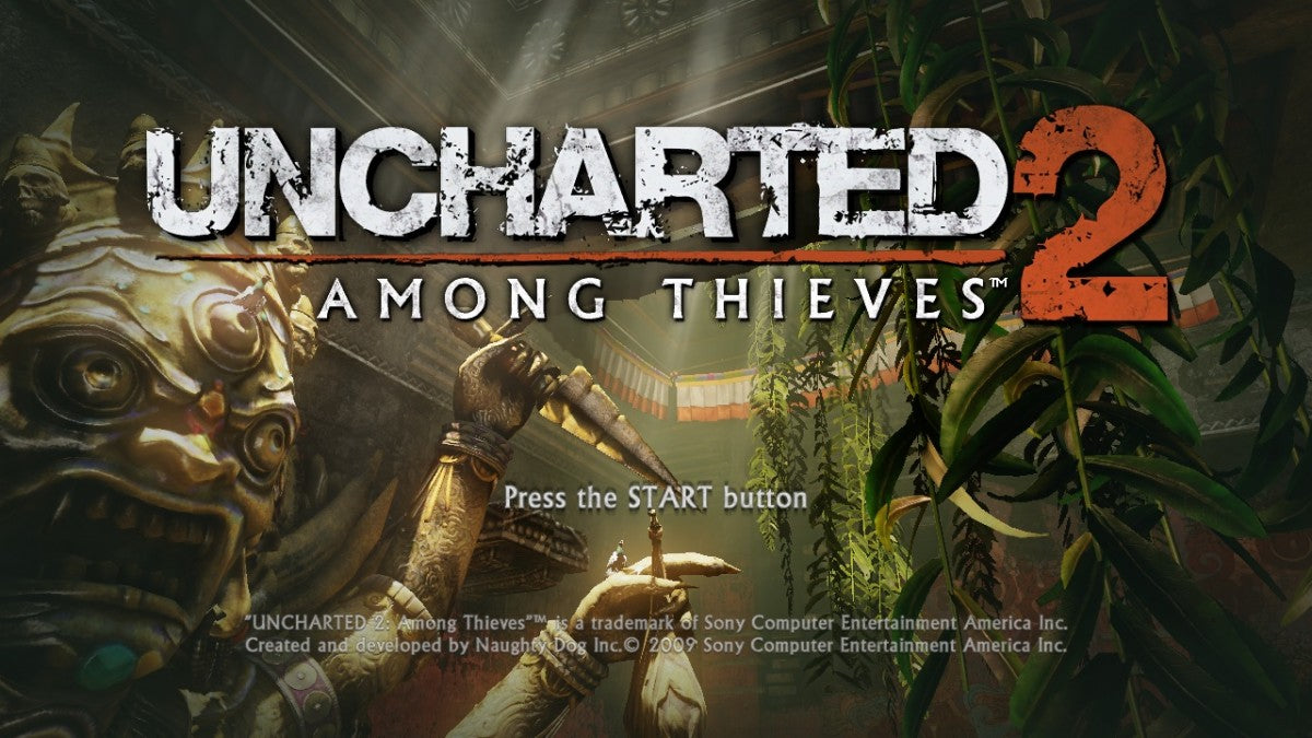 Uncharted 2 Among Thieves Game of the Year Greatest Hits for PlayStation 3, title screen for an action-adventure third-person shooter video game with cinematic storytelling, treasure hunting, platforming, and blockbuster combat gameplay