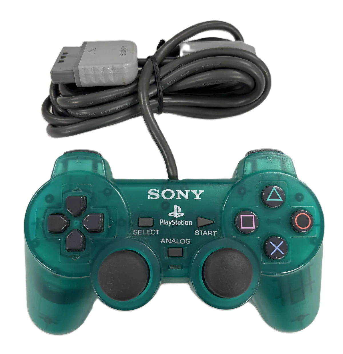 Emerald green PS1 DualShock controller with translucent casing and classic PlayStation buttons and analog sticks