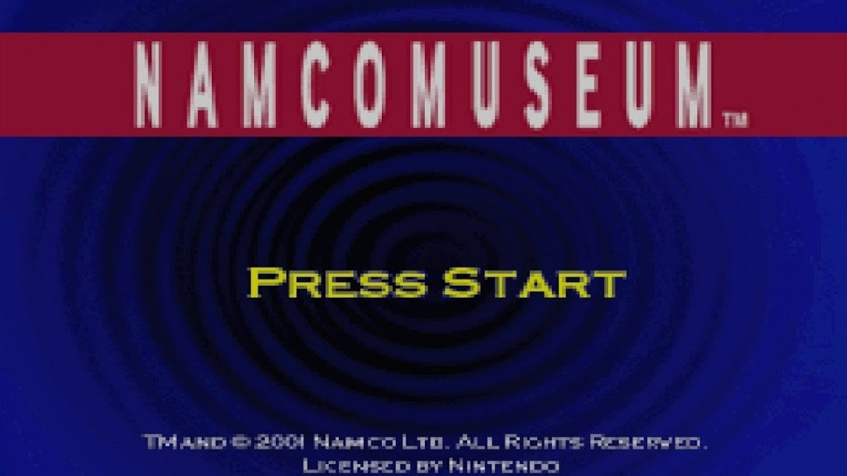 Namco Museum Game Boy Advance GBA compilation arcade classic video games collection including Pac-Man Ms Pac-Man Galaga Galaxian Dig Dug Pole Position and Rolling Thunder Namco Bandai anthology portable retro gaming main menu title screen