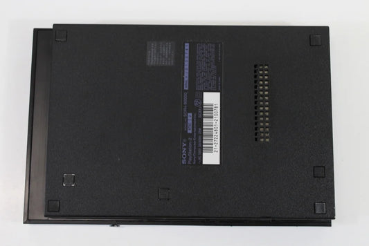 Sony PlayStation 2 Slim Console System (SCPH-90000) at Gamers INC, featuring a compact design with built-in AC adapter and PS1 backwards compatibility for playing your entire library of classic PlayStation and PS2 games with a 3rd party controller bottom side