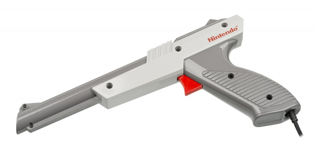 Nintendo Zapper OEM [Gray][In Box Missing Manuals/Inserts] for Nintendo Entertainment System (NES) accessory featuring the classic light gun controller used for Duck Hunt and other shooting games; includes the original box but is missing the manuals and inserts with an authentic gray OEM zapper inside accesory model