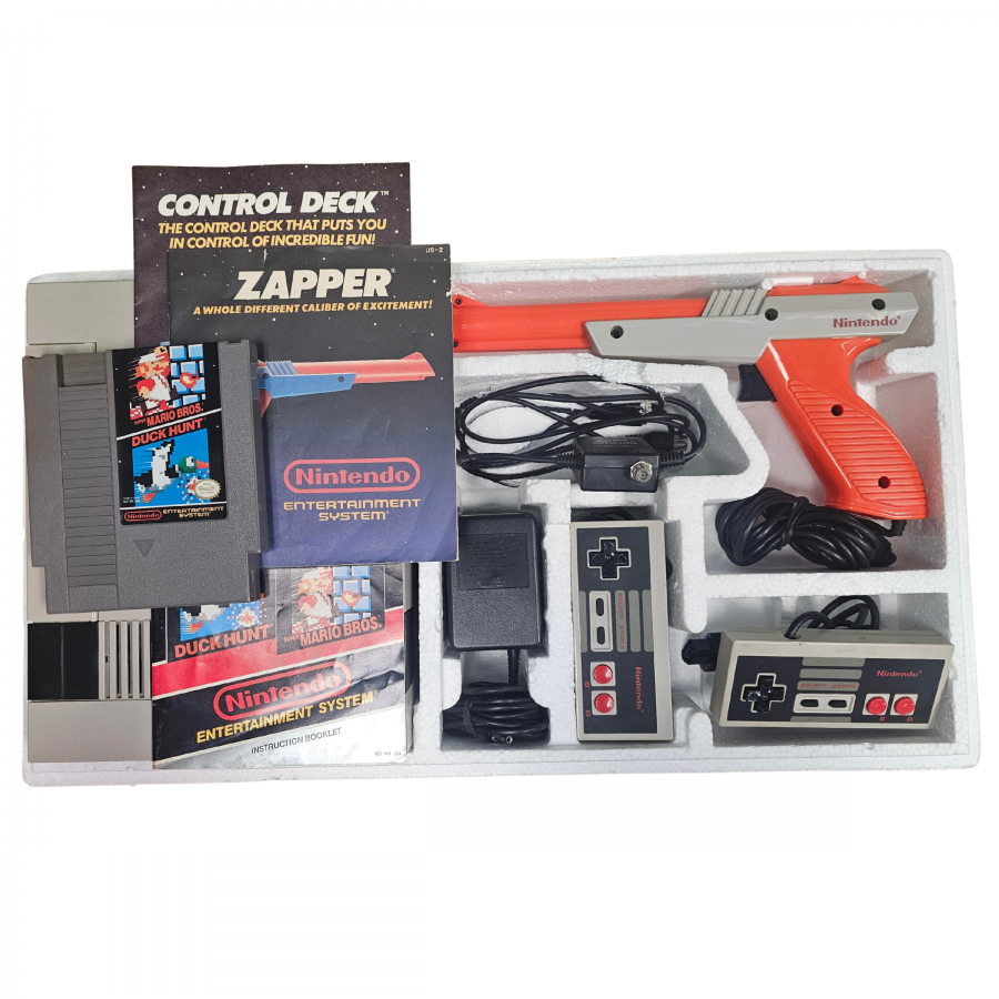 Nintendo Entertainment System NES Console Action Set CIB complete in box gaming system featuring the classic NES console controllers Zapper light gun game accessories original packaging home console setup classic Nintendo hardware and collectible retro gaming appeal box CIB contents