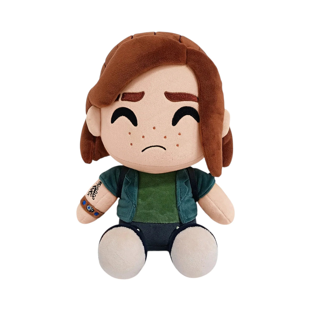 Ellie 9 Inch Plush collectible video game character plush featuring Ellie from The Last of Us soft plush construction detailed character styling 9 inch size huggable collectible display item gaming merchandise and pop culture collectible appeal front