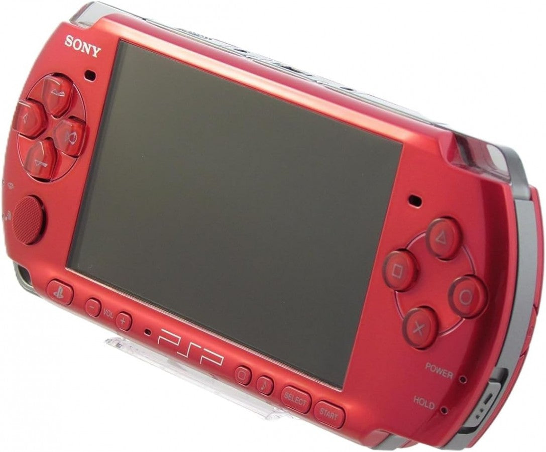 Red PlayStation Portable 3001 PSP 3001 handheld gaming console featuring vibrant red finish portable PlayStation gaming UMD game support widescreen LCD display built-in controls memory stick storage wireless connectivity and classic Sony handheld hardware collectible retro gaming appeal angle of console
