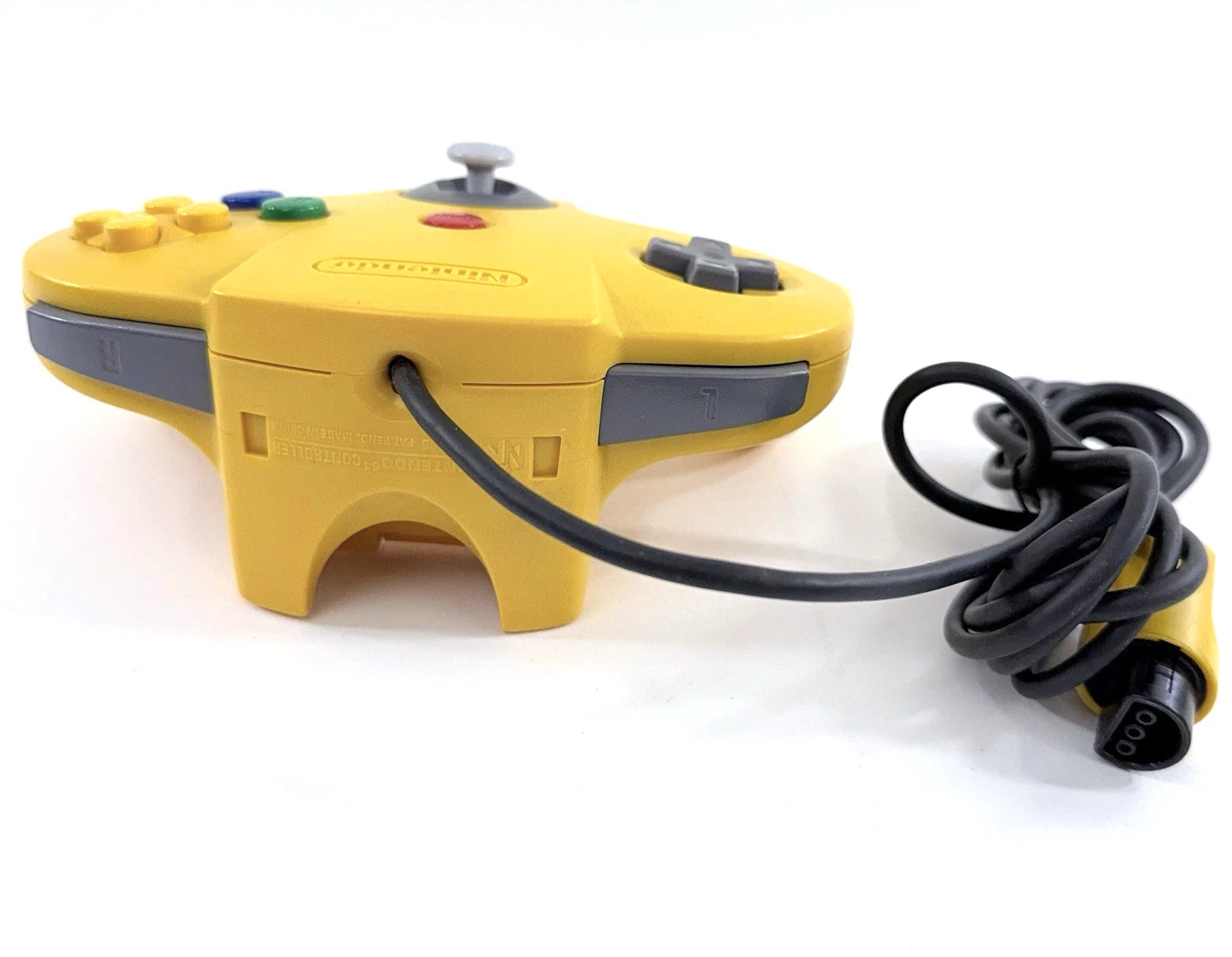 Nintendo 64 Controller Yellow OEM original first party controller for the Nintendo 64 featuring a bright yellow design with analog stick ergonomic three prong grip and responsive buttons for classic multiplayer gaming back 