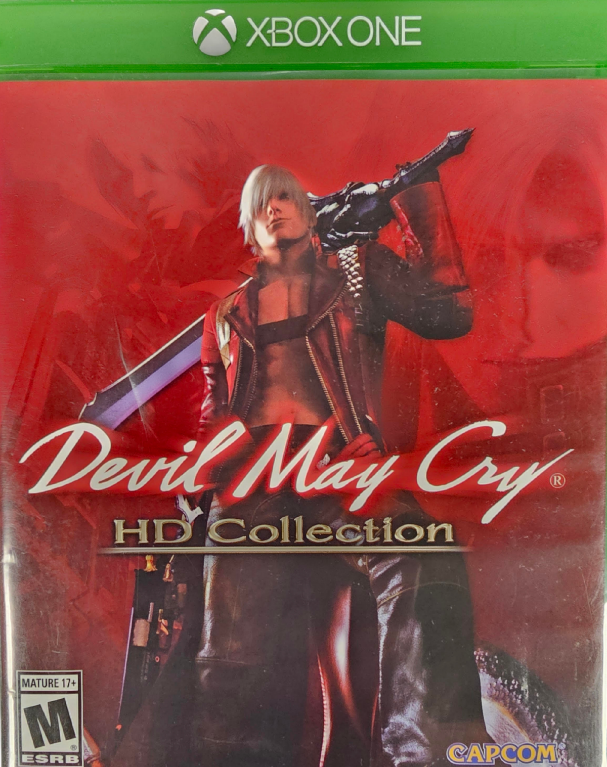 Devil May Cry HD Collection Xbox One XONE for action hack and slash video game fans featuring Dante demon hunting intense sword and gun combat powerful combos supernatural enemies challenging boss battles stylish action multiple adventures and high definition classic gameplay collectible gaming appeal front cover art