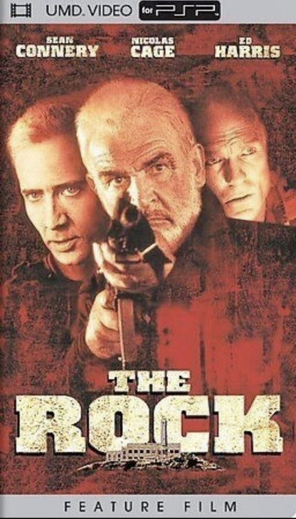 The Rock [PSP Movie] for PlayStation Portable (PSP) at Gamers INC, featuring the high-octane Michael Bay action blockbuster on Universal Media Disc (UMD) Video, where you follow a chemical weapons expert and a former SAS operative as they infiltrate Alcatraz to stop a rogue general—delivering explosive, cinematic entertainment optimized for the PSP’s vibrant handheld screen front cover