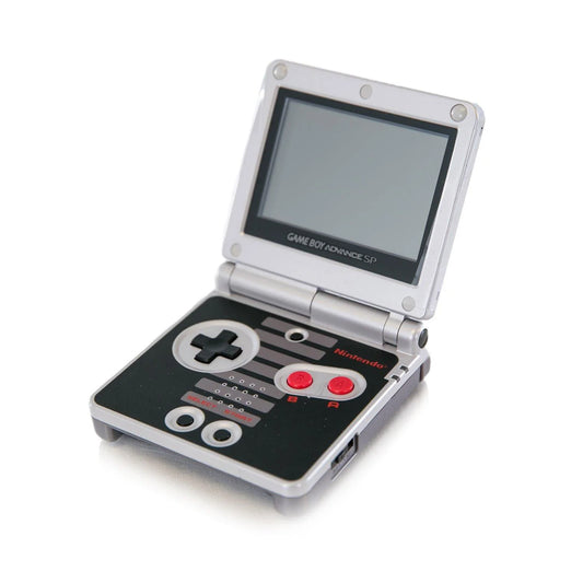 Game Boy Advance SP GBA SP AGS-101 NES Edition handheld gaming console featuring iconic NES inspired design bright backlit AGS-101 screen foldable clamshell form factor rechargeable battery Game Boy Advance and compatible Game Boy Color games portable gaming and visible scratches and scuffs collectible Nintendo hardware appeal front