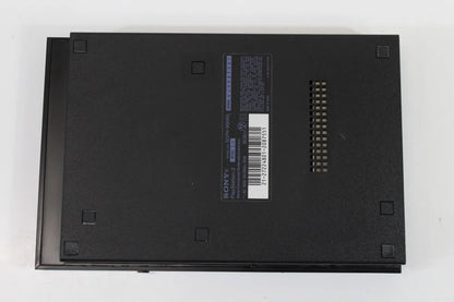bRetro PS2 Slim SCPH 90000 inspired design featuring sleek PlayStation 2 hardware aesthetic compact black console design iconic Sony gaming system integrated power supply streamlined form factor sixth generation gaming nostalgia presentation bottom