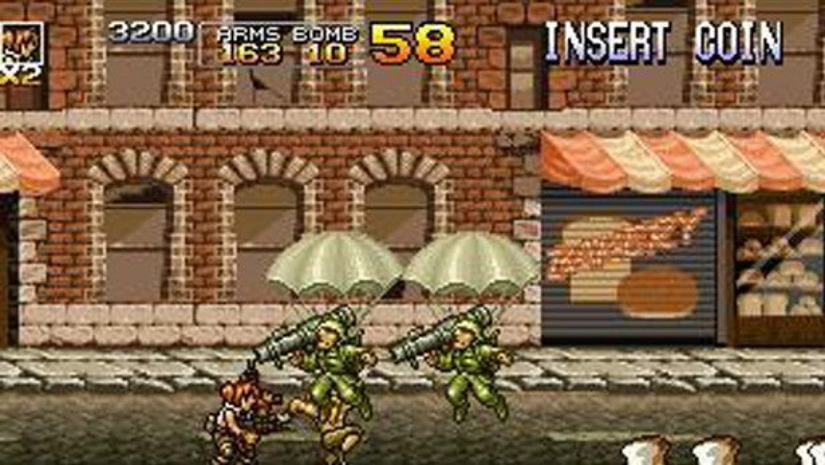 Metal Slug 4 & 5 gameplay for PlayStation 2 (PS2) featuring fast‑paced run‑and‑gun arcade action with explosive battles, vehicles, and cartoon‑style warfare.