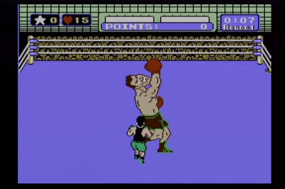Punch Out Nintendo Entertainment System NES video game featuring boxing sports gameplay Little Mac boxing matches opponent battles dodging punches counter attacks knockout challenges training and classic 8 bit Nintendo arcade sports gameplay retro video game collection collectible gaming appeal gameplay