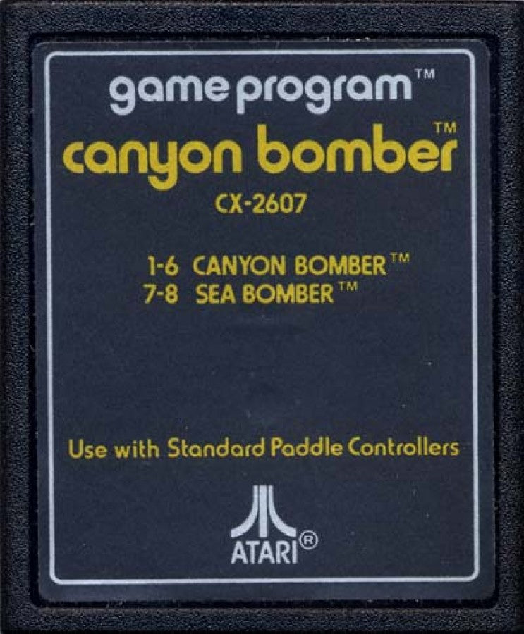 Canyon Bomber retro Atari 2600 video game featuring arcade bombing gameplay, aerial combat action, multiplayer challenges and classic Atari entertainment - cartridge