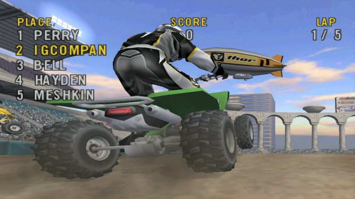 ATV Offroad Fury off road racing video game featuring high speed ATV competitions open outdoor tracks stunt based gameplay and classic PlayStation extreme sports racing experience gameplay